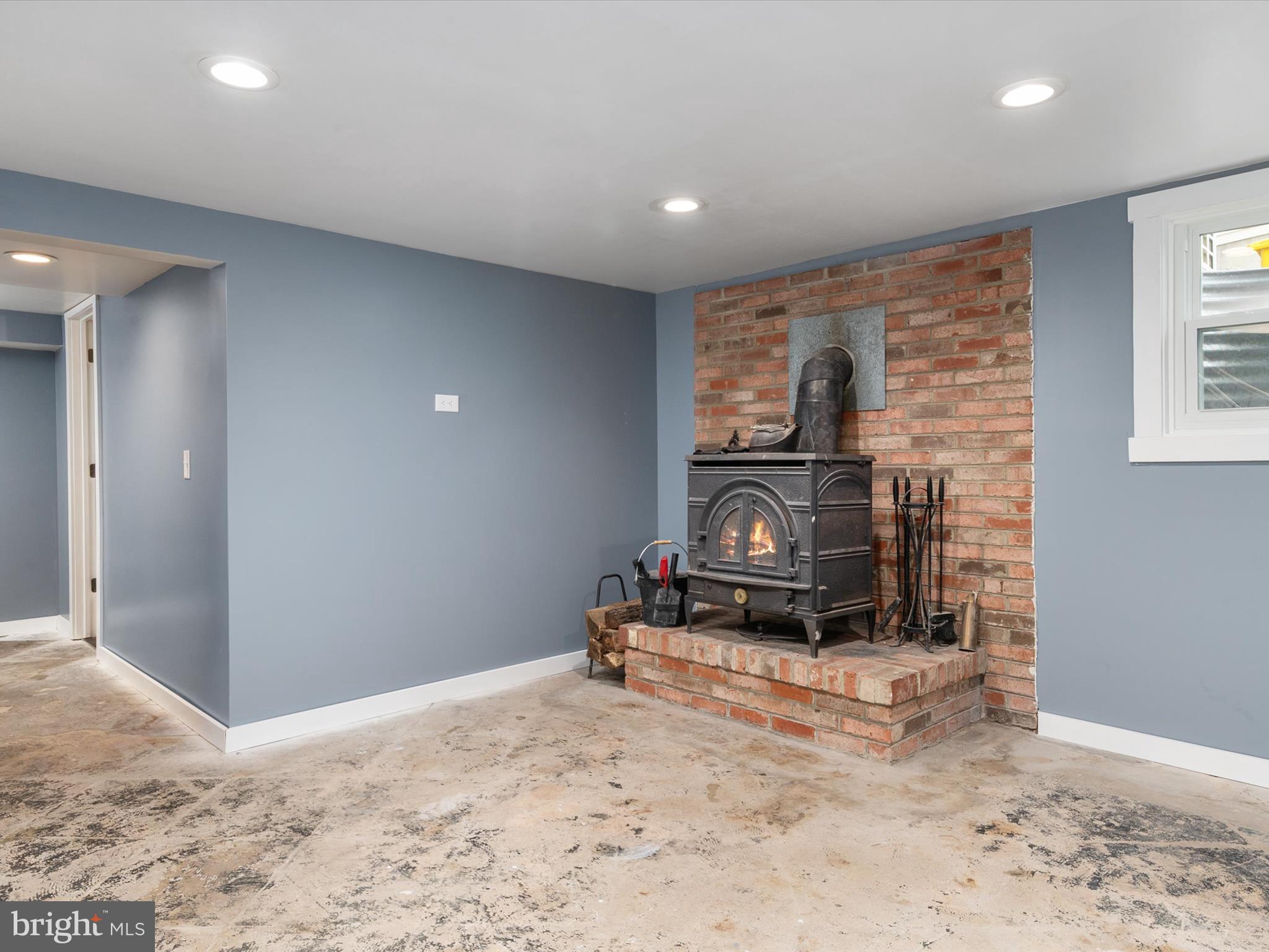 9 Lexington Road Harmans, MD 21077 - Photo 27 of 41 a view of a livingroom with a fireplace