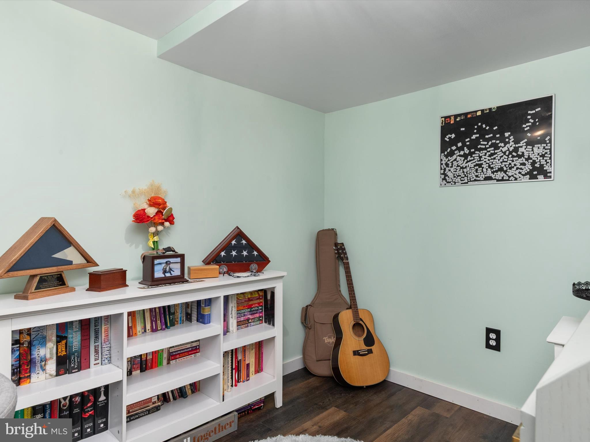 9 Lexington Road Harmans, MD 21077 - Photo 34 of 41 a book shelf with books and knick knacks on it