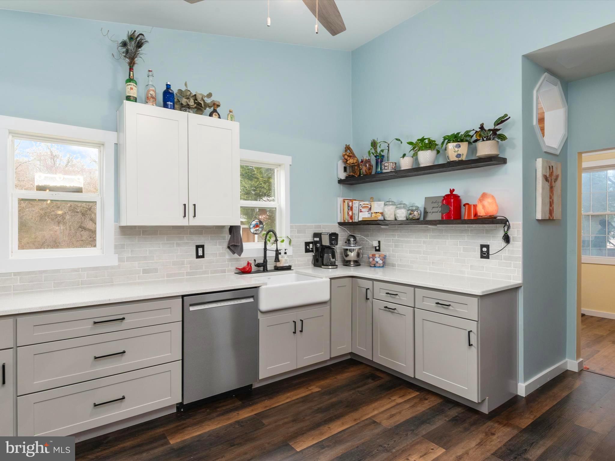 9 Lexington Road Harmans, MD 21077 - Photo 8 of 41 a kitchen with a white cabinets and window