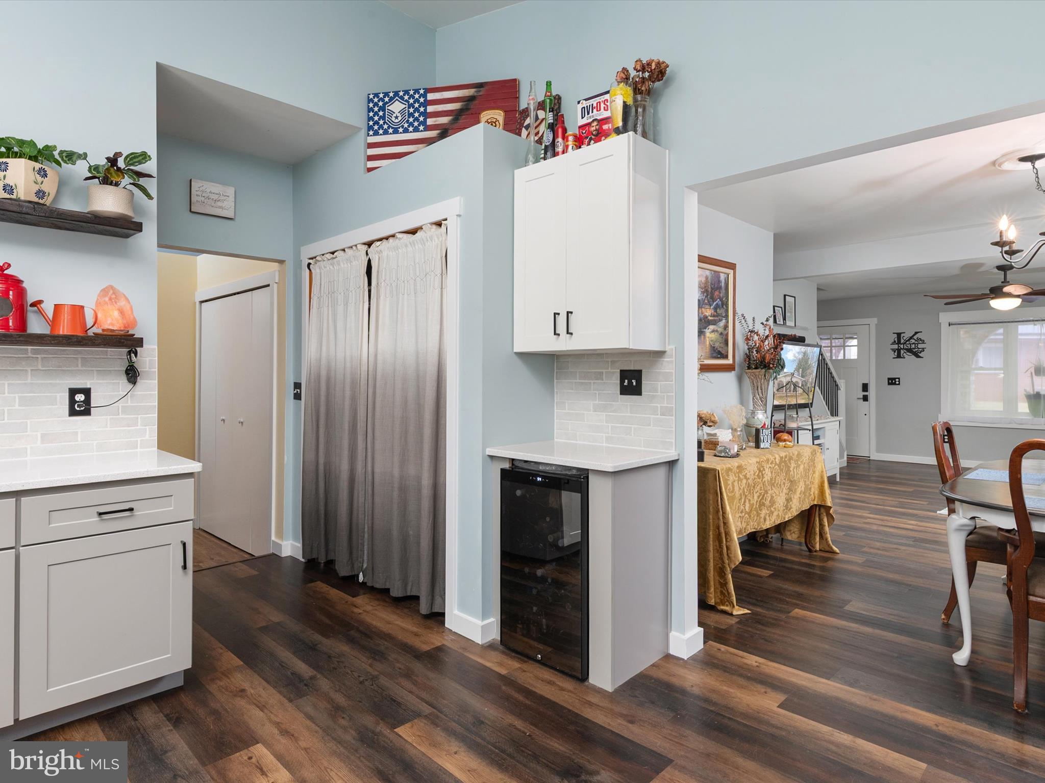 9 Lexington Road Harmans, MD 21077 - Photo 10 of 41 a view of kitchen with cabinets and wooden floor