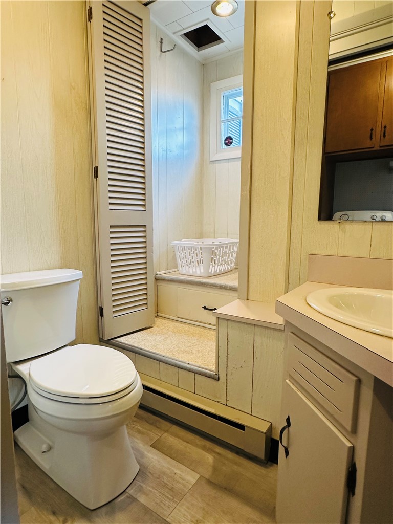 263 East Genesee Street Auburn, NY 13021 - Photo 24 of 50 The 1st floor half bath and the laundry basket is