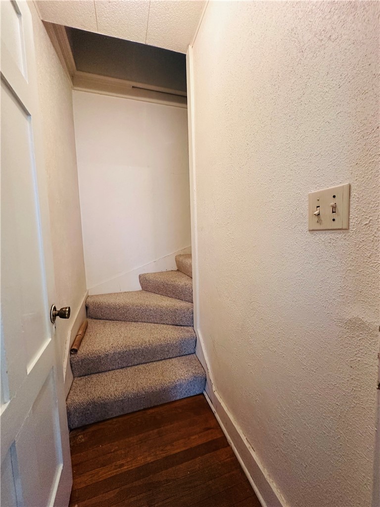 263 East Genesee Street Auburn, NY 13021 - Photo 40 of 50 Stairs to the walk up finished attic.