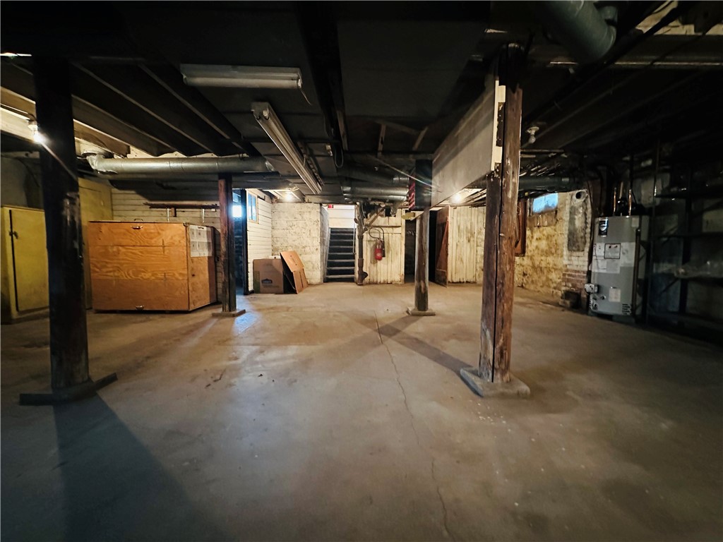 263 East Genesee Street Auburn, NY 13021 - Photo 44 of 50 The full basement looking towards the stairs. Tur