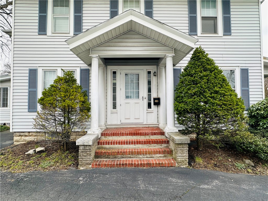 263 East Genesee Street Auburn, NY 13021 - Photo 8 of 50 The side entrance to the home.