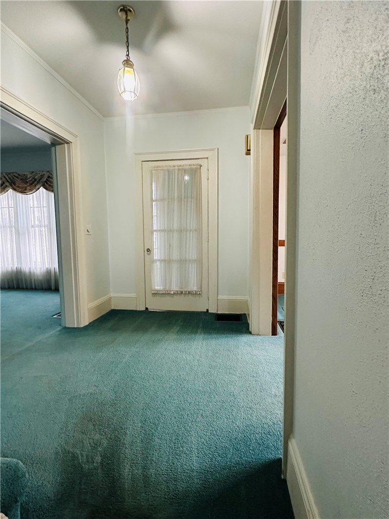 263 East Genesee Street Auburn, NY 13021 - Photo 10 of 50 The foyer area looking towards the side entrance.