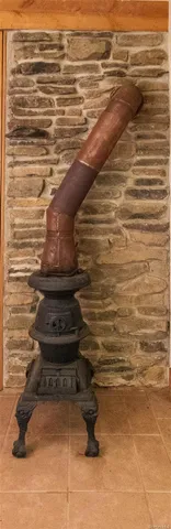 a balcony with furniture and a window