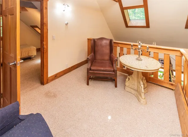 a bathroom with a toilet and a bathtub