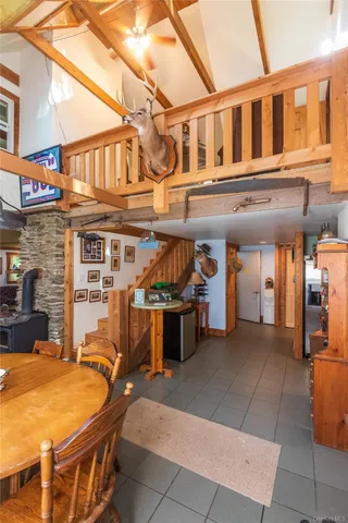 a living room with furniture flat screen tv and a fireplace