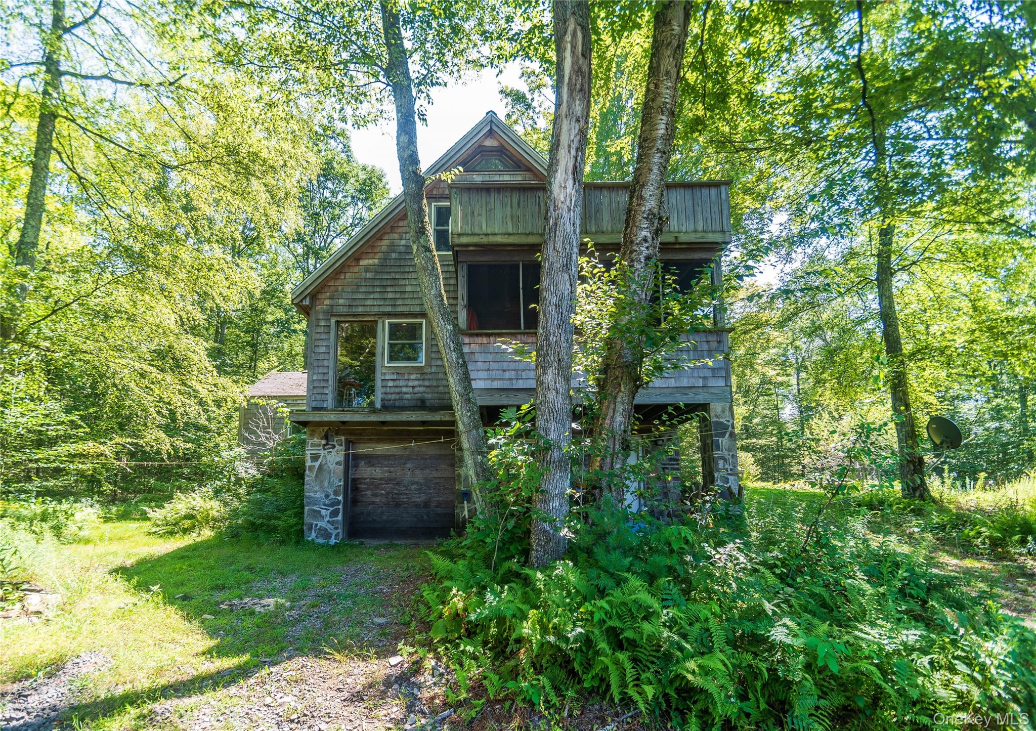 885 Grandview Road Hancock, NY 13783 - Photo 43 of 45 front view of a house with a garden
