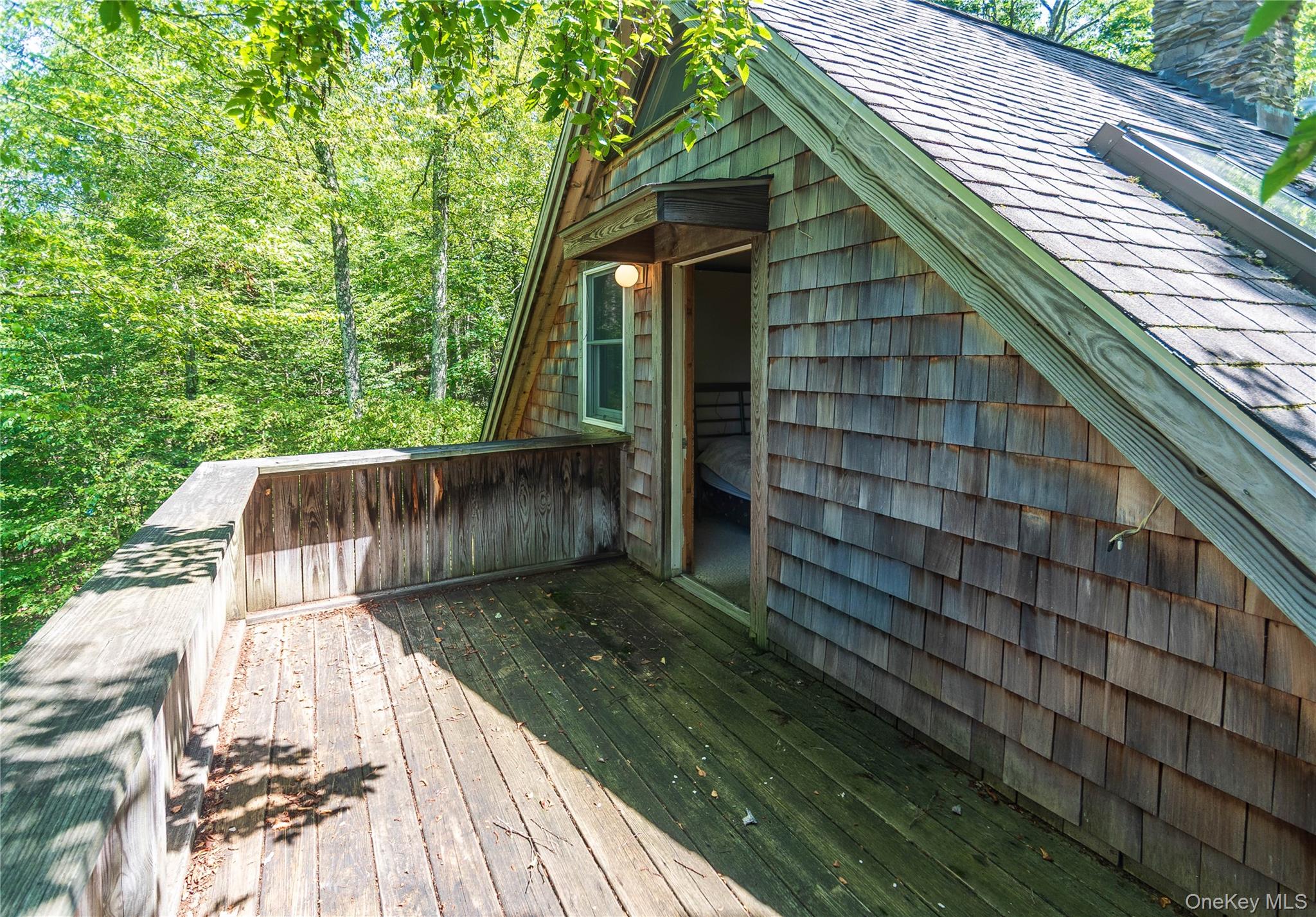 885 Grandview Road Hancock, NY 13783 - Photo 6 of 45 a view of backyard with wooden fence and large trees