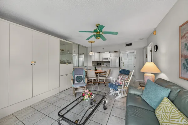 a living room with furniture and a table