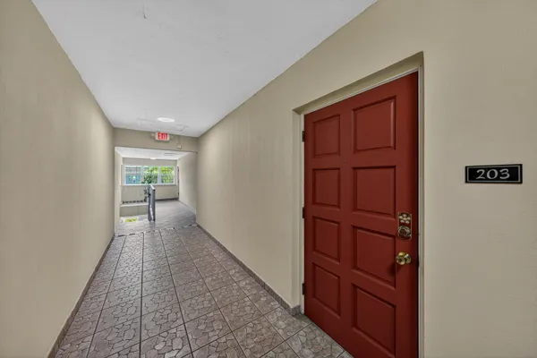 wooden floor in a hall with an entryway