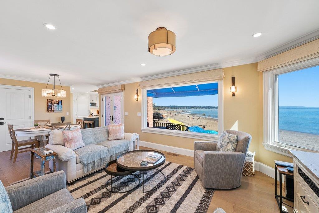 1500 Wharf Road, Unit 22 Capitola, CA 95010 - Photo 13 of 48 a living room with furniture a rug and a large window