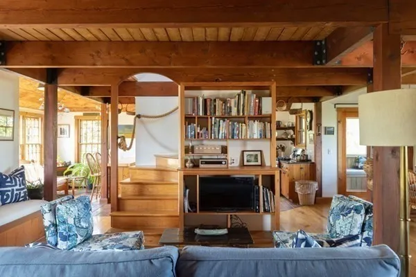 a front view of a house with wooden floor