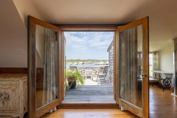 a view of a living room and hardwood floor