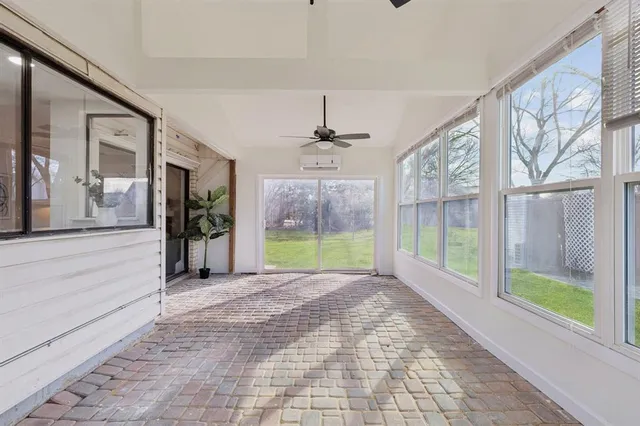 a view of a garden with an outdoor space