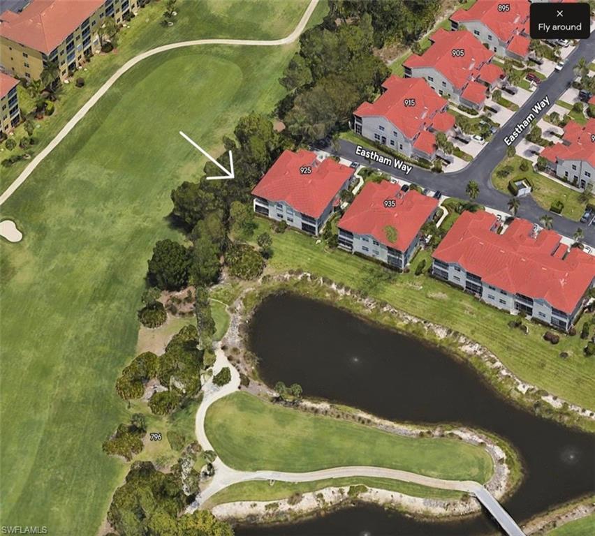 925 Eastham Way, Unit J102 Naples, FL 34104 - Photo 4 of 13 an aerial view of a pool