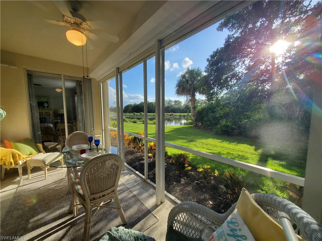 925 Eastham Way, Unit J102 Naples, FL 34104 - Photo 9 of 13 a view of a porch with furniture