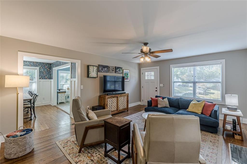 3424 Old Jonesboro Road Atlanta, GA 30354 - Photo 13 of 75 a living room with furniture a window and a flat screen tv