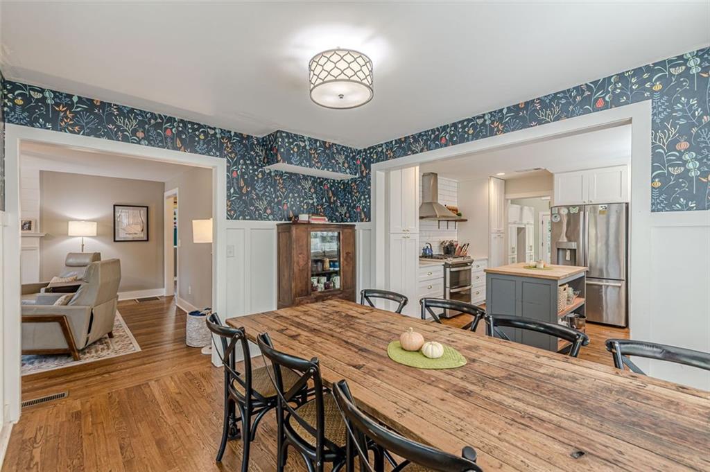 3424 Old Jonesboro Road Atlanta, GA 30354 - Photo 17 of 75 a view of a dining room with furniture and wooden floor