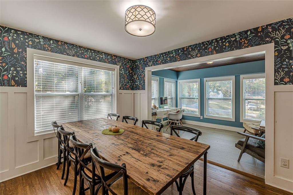3424 Old Jonesboro Road Atlanta, GA 30354 - Photo 19 of 75 a view of a dining room with furniture window and wooden floor