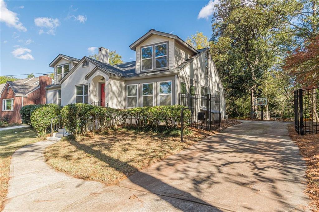 3424 Old Jonesboro Road Atlanta, GA 30354 - Photo 3 of 75 a front view of a house with a yard