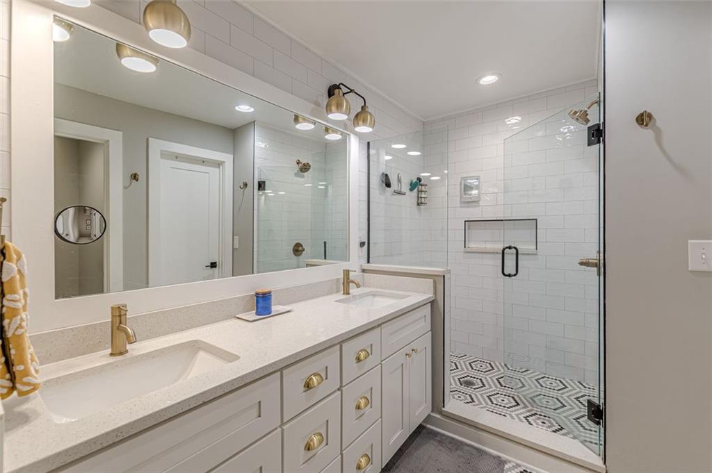 3424 Old Jonesboro Road Atlanta, GA 30354 - Photo 41 of 75 a bathroom with double sink and a mirror