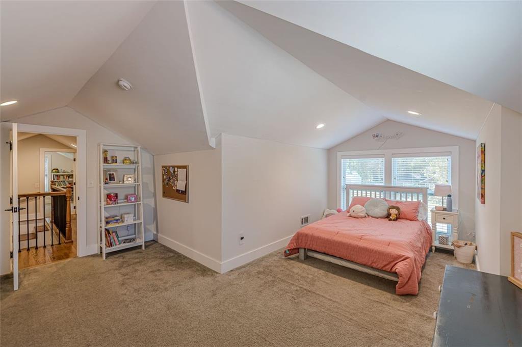 3424 Old Jonesboro Road Atlanta, GA 30354 - Photo 49 of 75 a bedroom with a bed and a large window