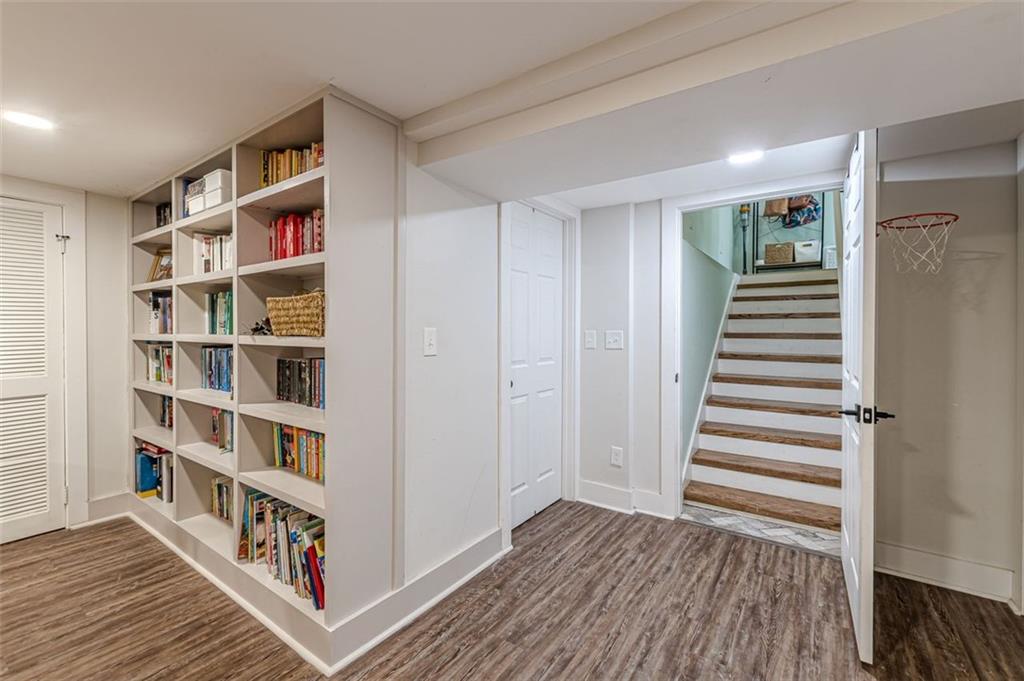 3424 Old Jonesboro Road Atlanta, GA 30354 - Photo 59 of 75 a view of an empty room with closet and wooden floor
