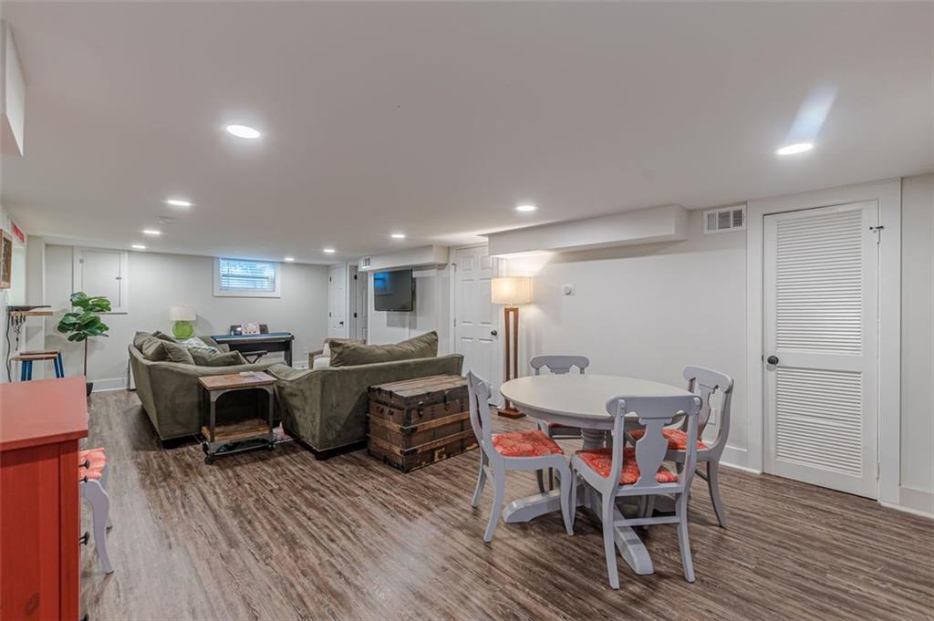 3424 Old Jonesboro Road Atlanta, GA 30354 - Photo 60 of 75 a view of a dining room with furniture window and wooden floor