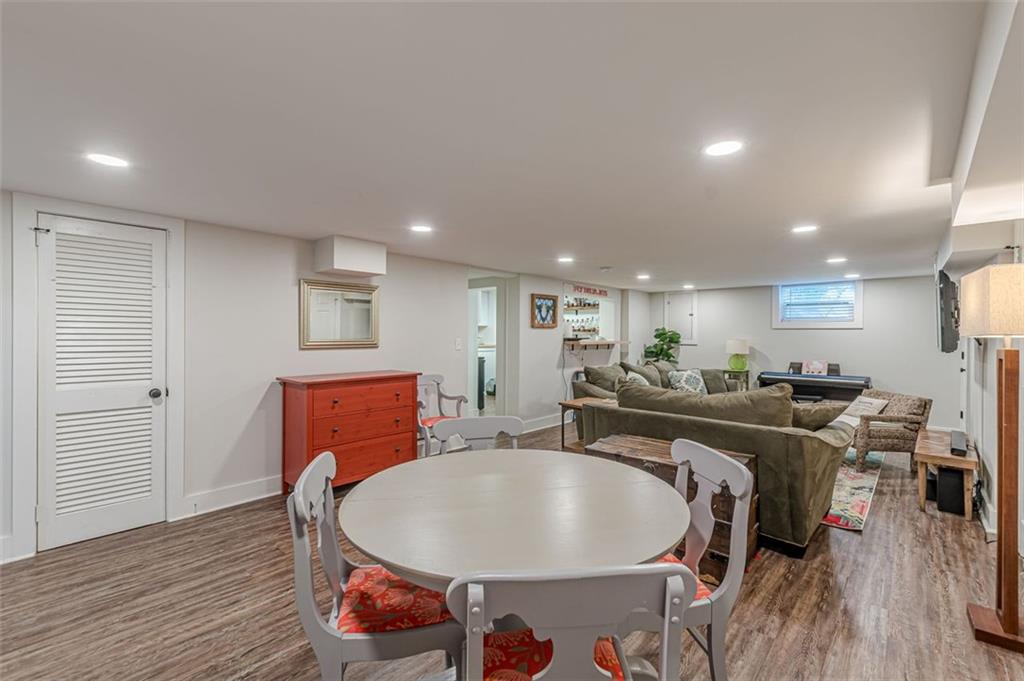 3424 Old Jonesboro Road Atlanta, GA 30354 - Photo 61 of 75 a view of a dining room with furniture wooden floor and chandelier