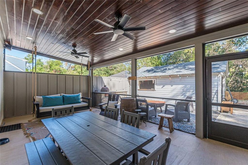 3424 Old Jonesboro Road Atlanta, GA 30354 - Photo 9 of 75 a outdoor space with patio lots of furniture and wooden floors