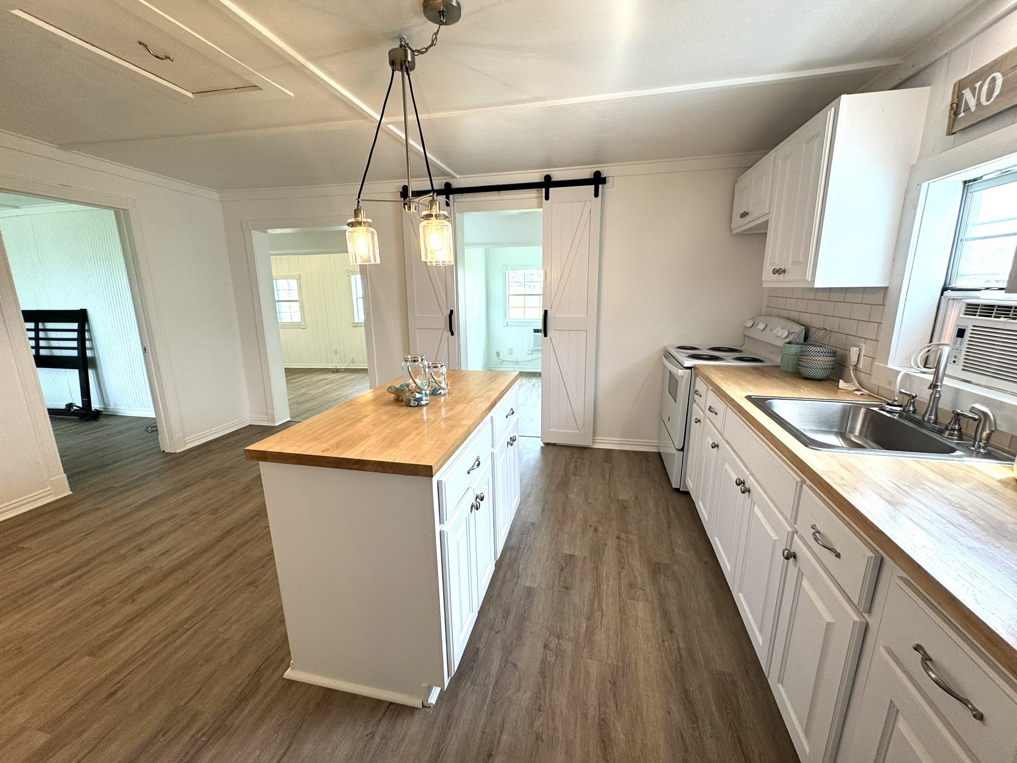 302 2nd Street Palacios, TX 77465 - Photo 21 of 45 a view of kitchen with sink and wooden floor
