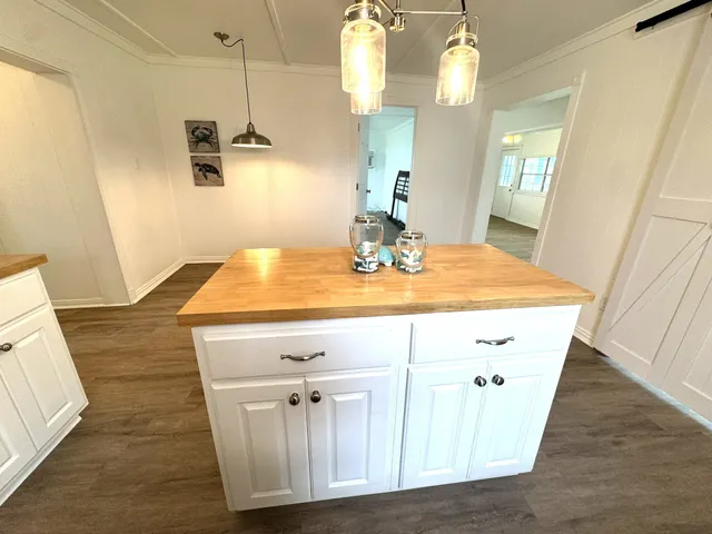 a view of dining room with wooden floor