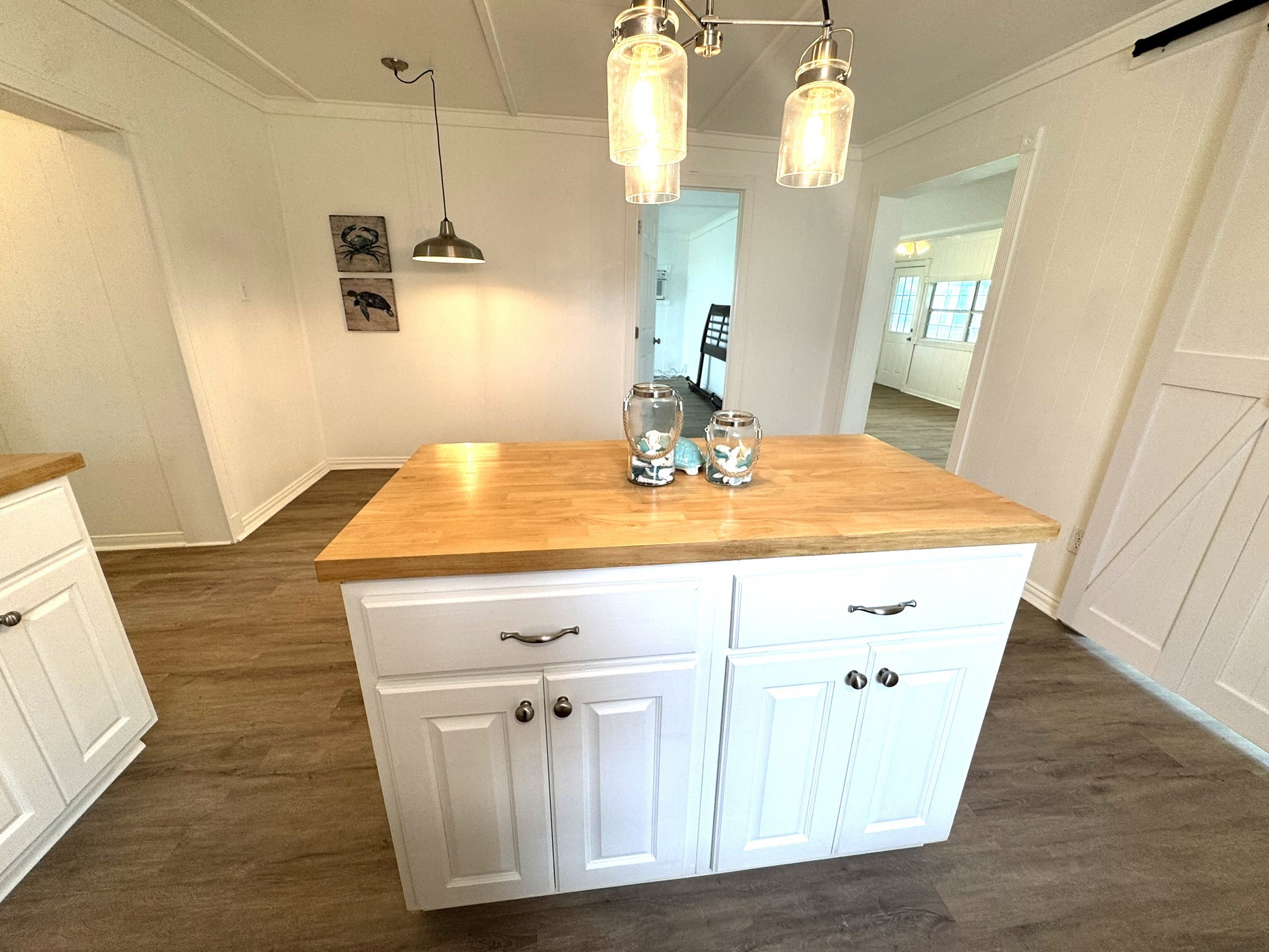 302 2nd Street Palacios, TX 77465 - Photo 27 of 45 a view of dining room with wooden floor