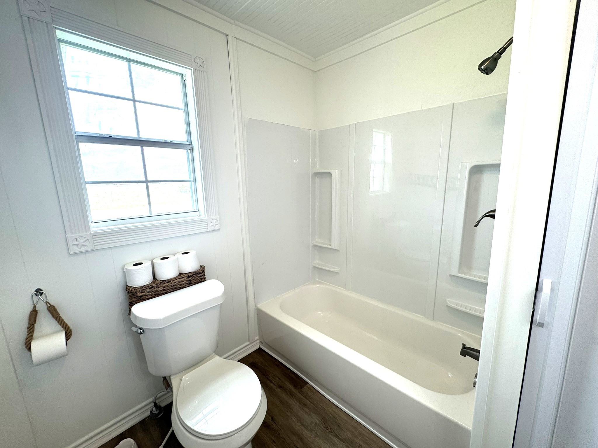 302 2nd Street Palacios, TX 77465 - Photo 30 of 45 a bathroom with a bathtub toilet and sink