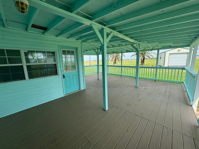 a view of backyard with green space
