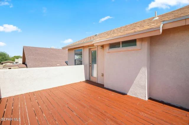 a view of a backyard of the house