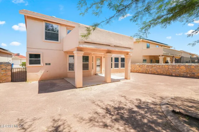 a view of a house with a snow in the yard