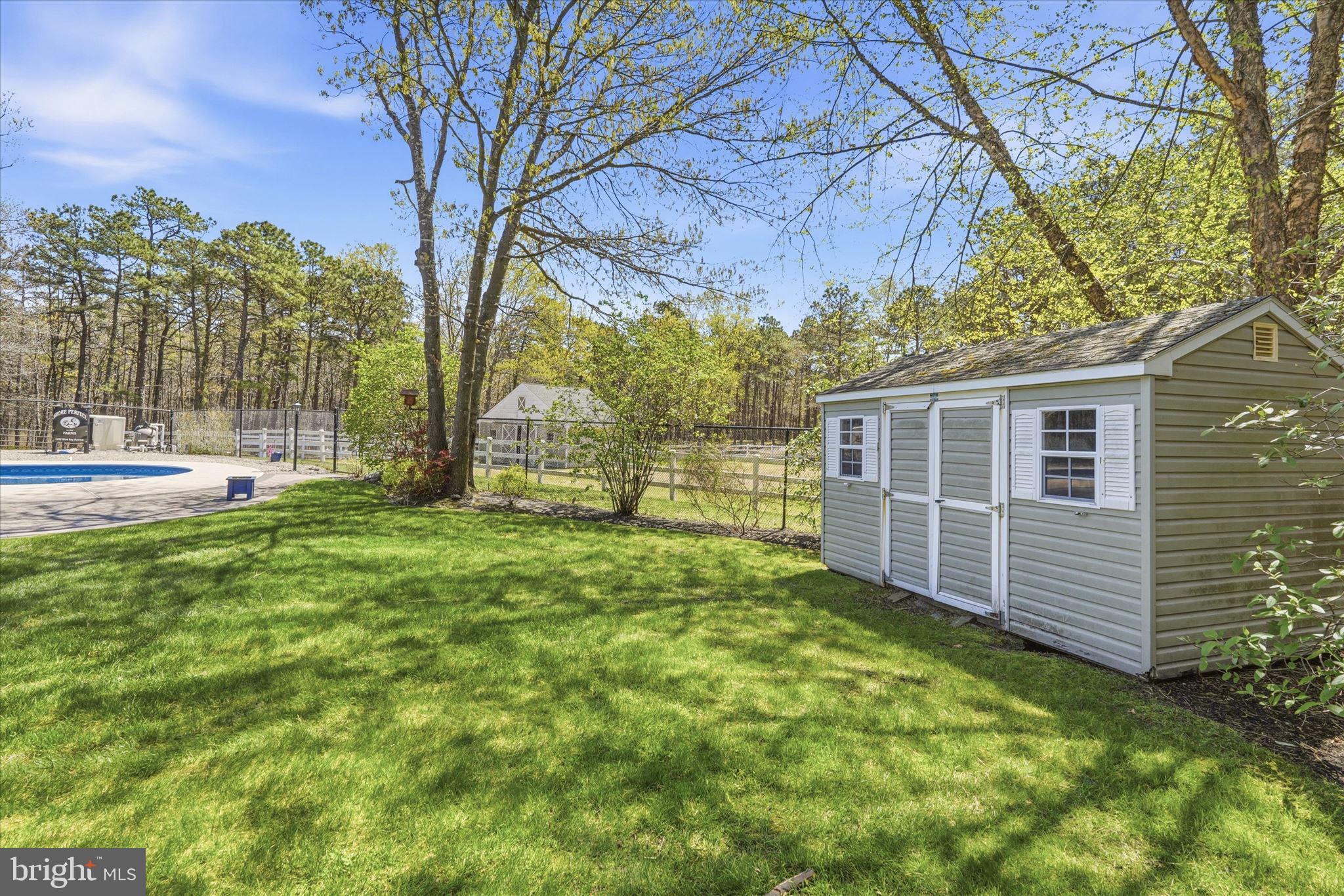 176 Warren Grove Road Barnegat, NJ 08005 - Photo 53 of 71 a view of a backyard with large tree