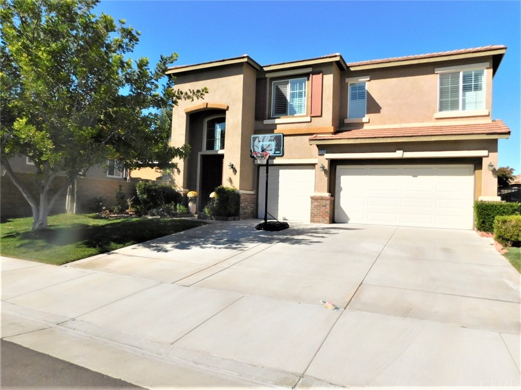31524 Borega Road Murrieta, CA 92563 - Photo 1 of 1 a front view of a house with garden
