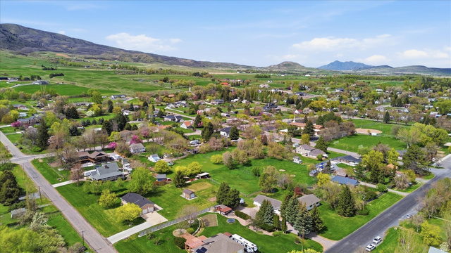 45 West 100 South Mendon, UT 84325 - Photo 58 of 64 Aerial view of residential area with a mountain backdrop