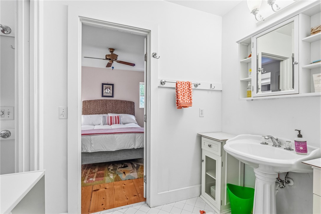 3628 Rio Vista Boulevard Vero Beach, FL 32963 - Photo 18 of 29 a bathroom with a sink and a mirror