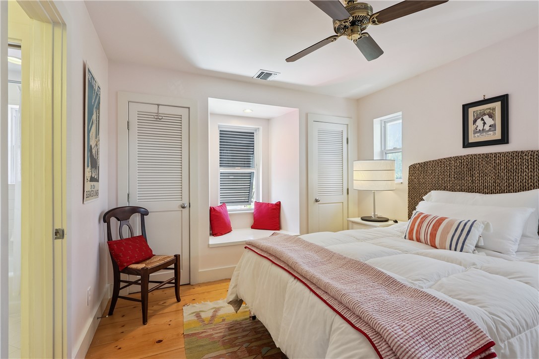 3628 Rio Vista Boulevard Vero Beach, FL 32963 - Photo 19 of 29 a bedroom with a bed and furniture