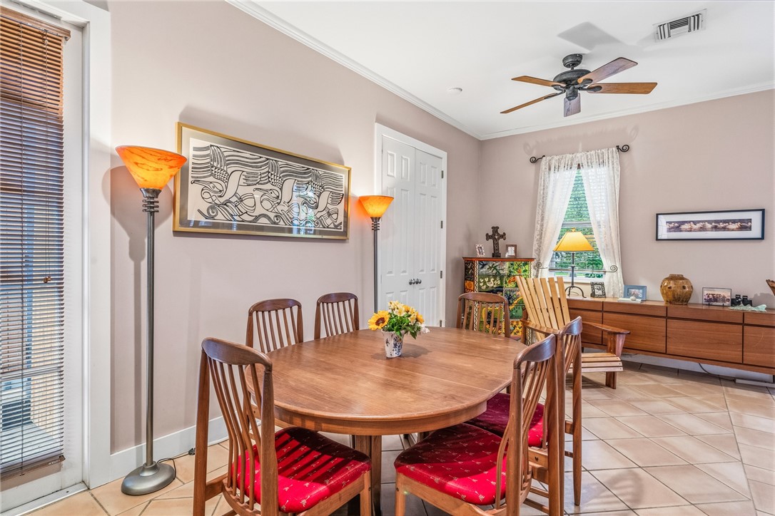 3628 Rio Vista Boulevard Vero Beach, FL 32963 - Photo 5 of 29 a view of a dining room with furniture and a chandelier