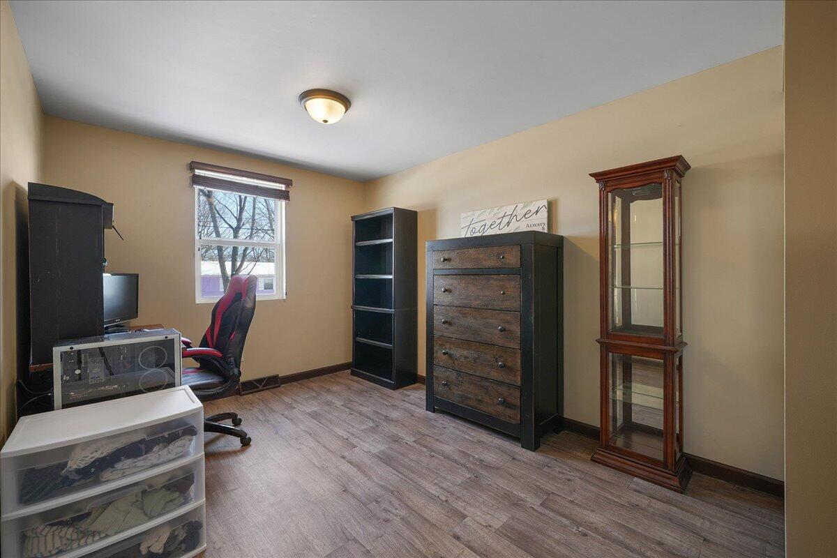854 Fairview Street Westville, IN 46391 - Photo 12 of 19 a view of workspace with furniture and wooden floor