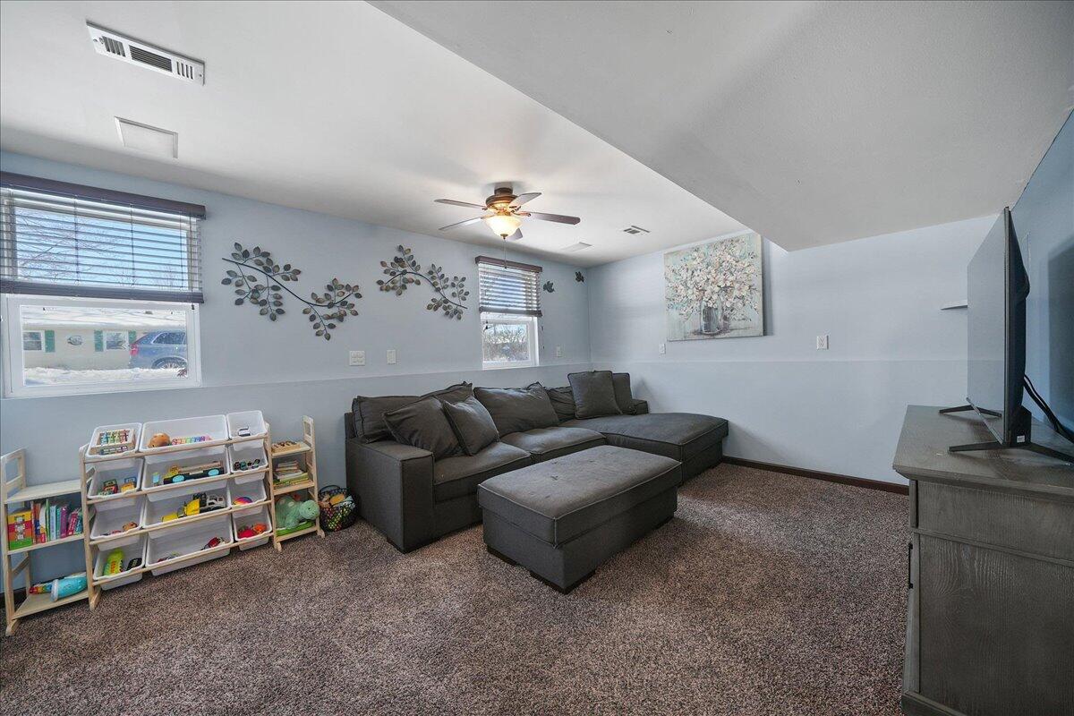854 Fairview Street Westville, IN 46391 - Photo 13 of 19 a living room with furniture and a flat screen tv