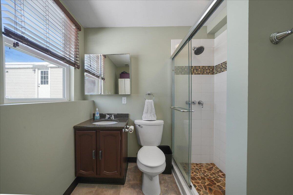 854 Fairview Street Westville, IN 46391 - Photo 15 of 19 a bathroom with a toilet sink and mirror