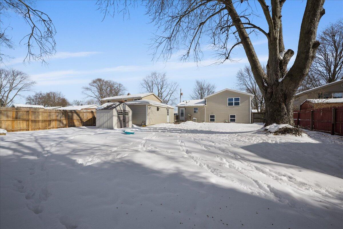 854 Fairview Street Westville, IN 46391 - Photo 19 of 19 a white house that has a tree in front of it