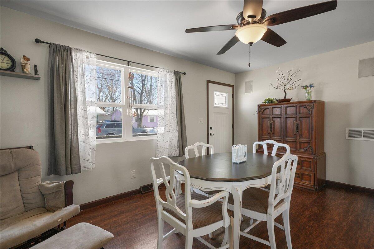 854 Fairview Street Westville, IN 46391 - Photo 5 of 19 a view of a dining room with furniture window and wooden floor